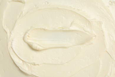 Photo of Texture of tasty butter as background, top view