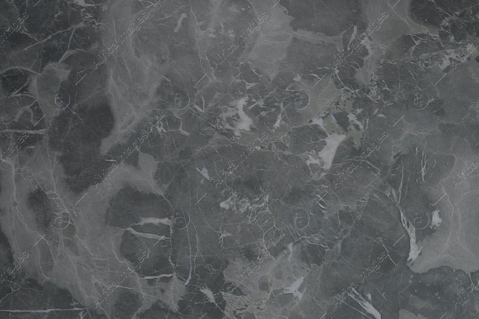 Photo of Texture of grey marble surface as background, closeup