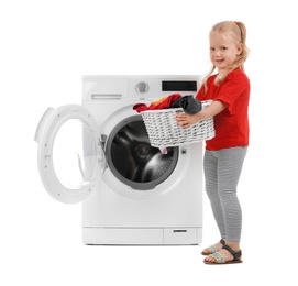 Photo of Cute little girl holding basket with laundry near washing machine on white background