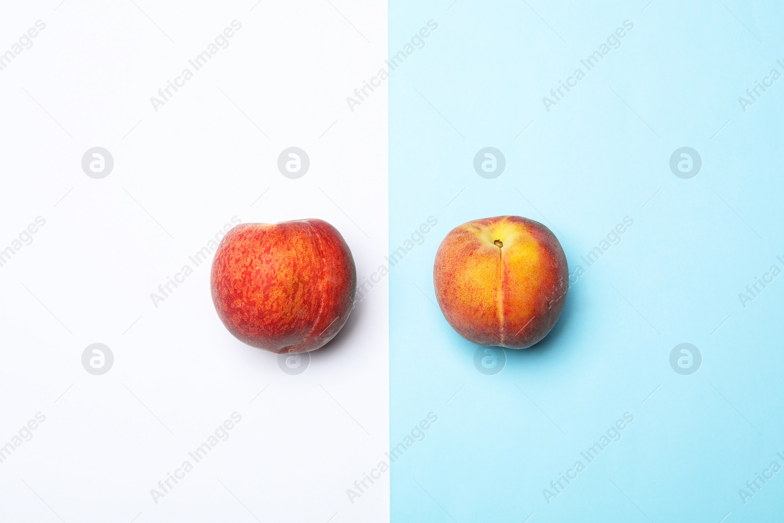 Photo of Flat lay composition with ripe peaches on color background