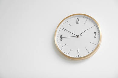 Stylish clock on white background. Time concept