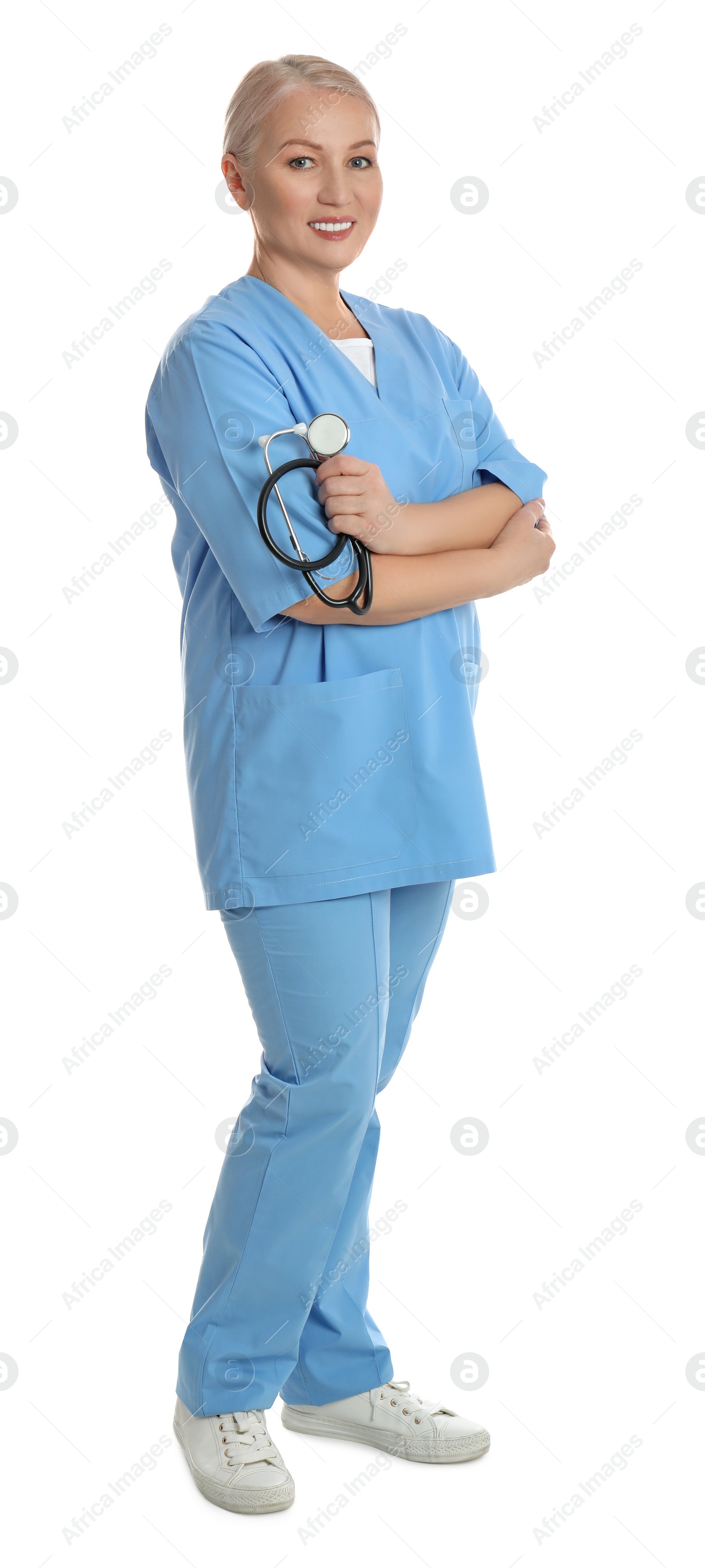 Photo of Full length portrait of mature doctor with stethoscope on white background