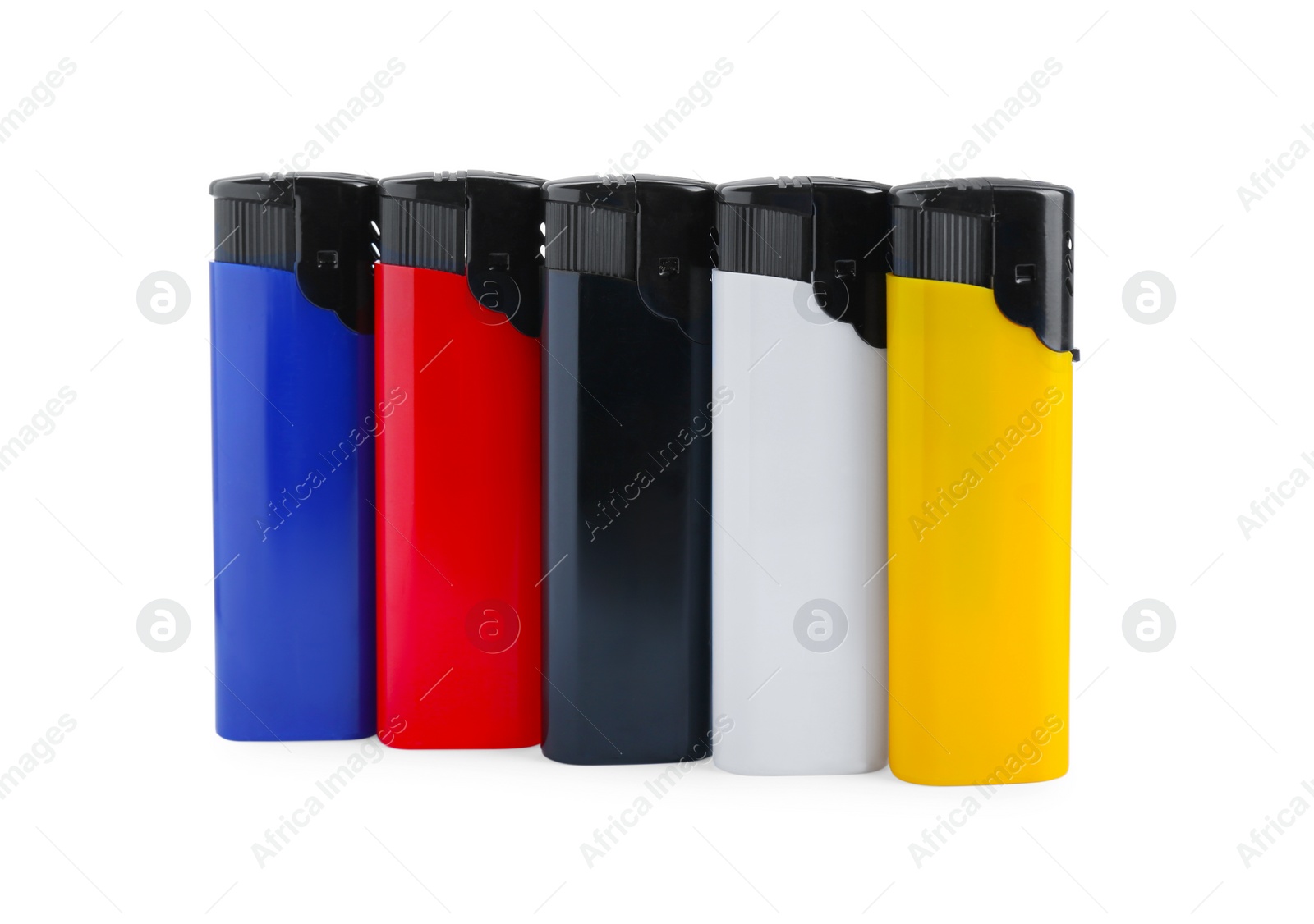 Photo of Stylish small pocket lighters on white background