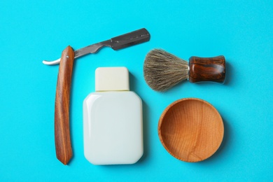 Photo of Flat lay composition with shaving accessories for men on color background