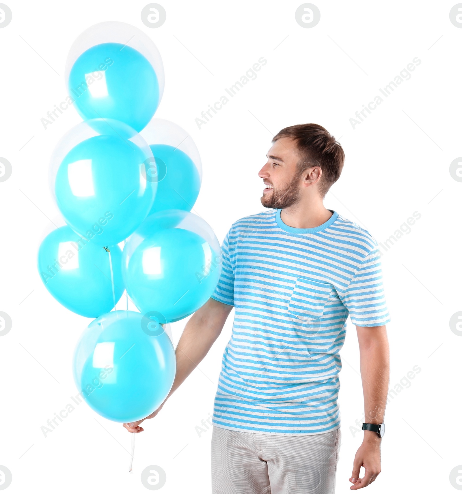 Photo of Young man with air balloons on white background