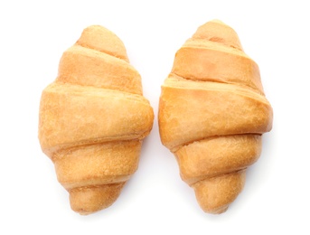 Photo of Tasty croissants on white background