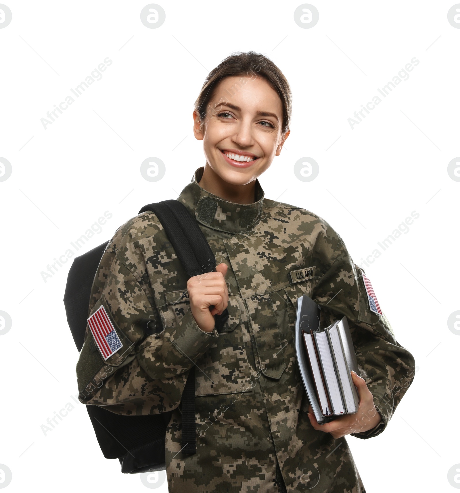 Photo of Female cadet with backpack and books isolated on white. Military education