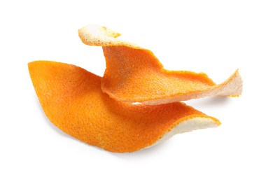 Photo of Dry orange fruit peels on white background