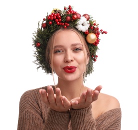 Photo of Beautiful young woman wearing Christmas wreath on white background