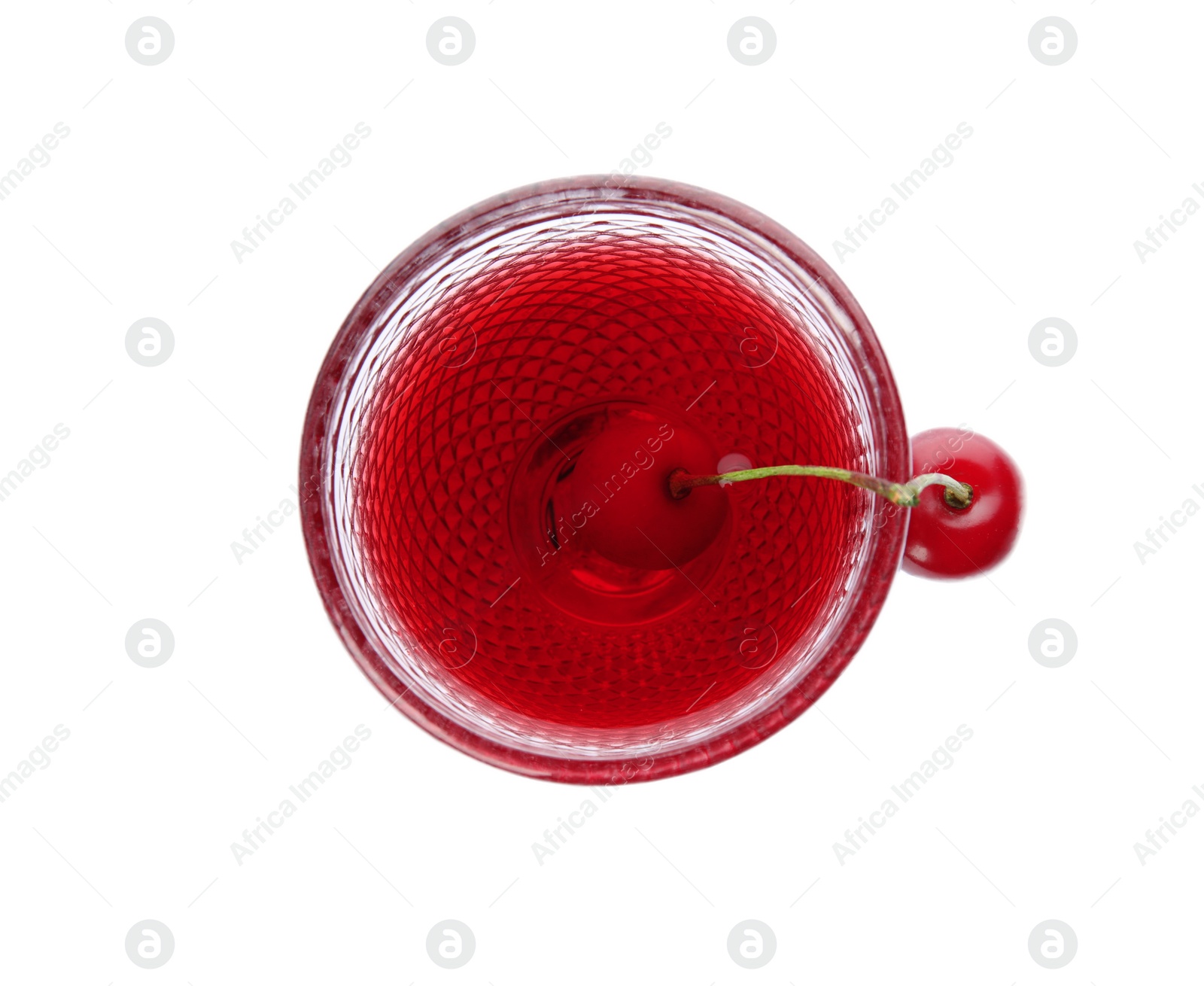 Photo of Delicious cherry wine with ripe juicy berries isolated on white, top view