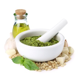 Photo of Composition with mortar of tasty pesto sauce and pestle isolated on white