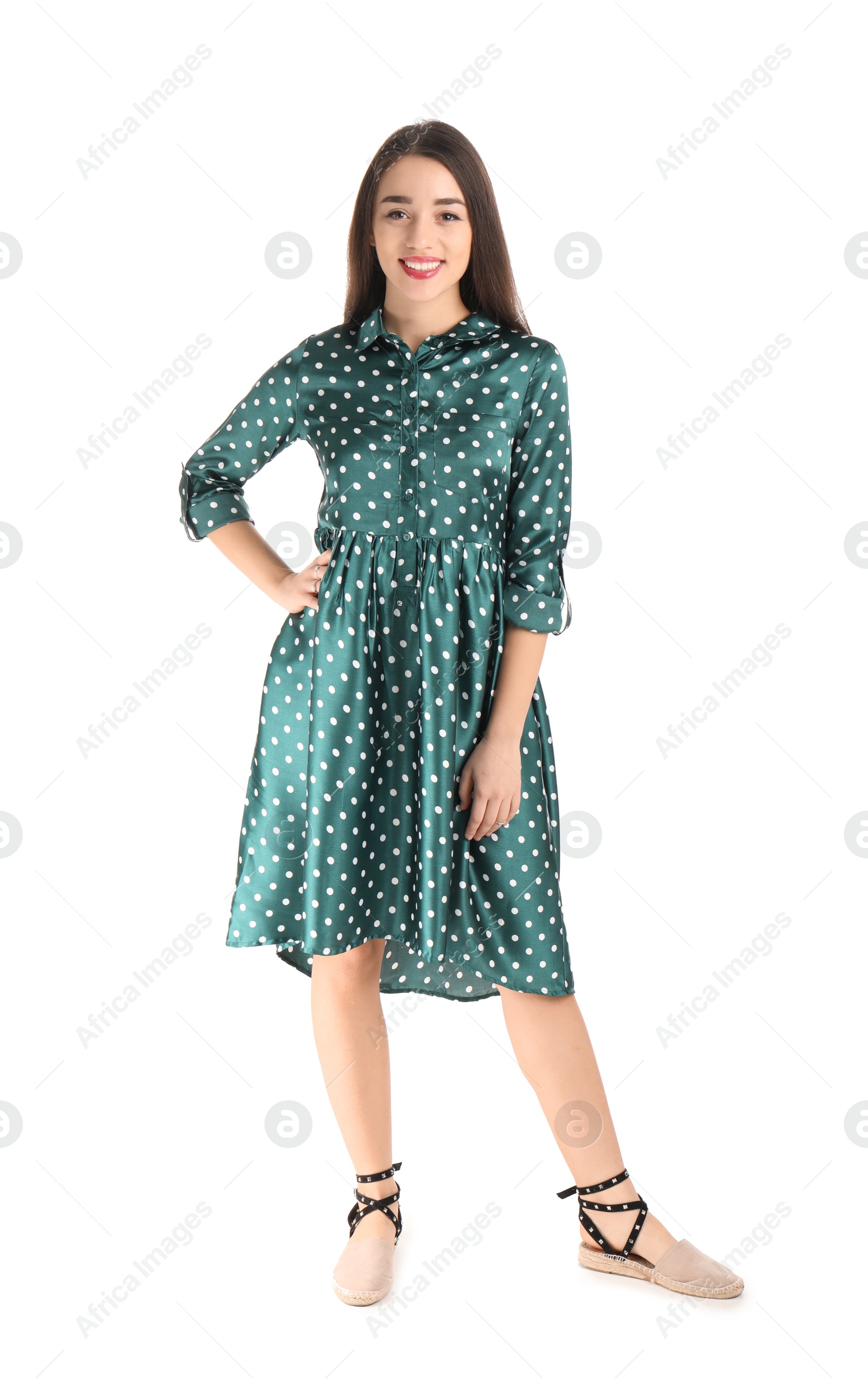 Photo of Portrait of beautiful young woman in stylish dress on white background