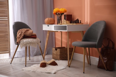 Photo of Cozy room interior inspired by autumn colors