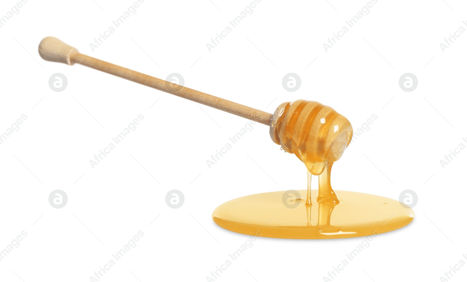 Photo of Natural honey dripping from dipper on white background