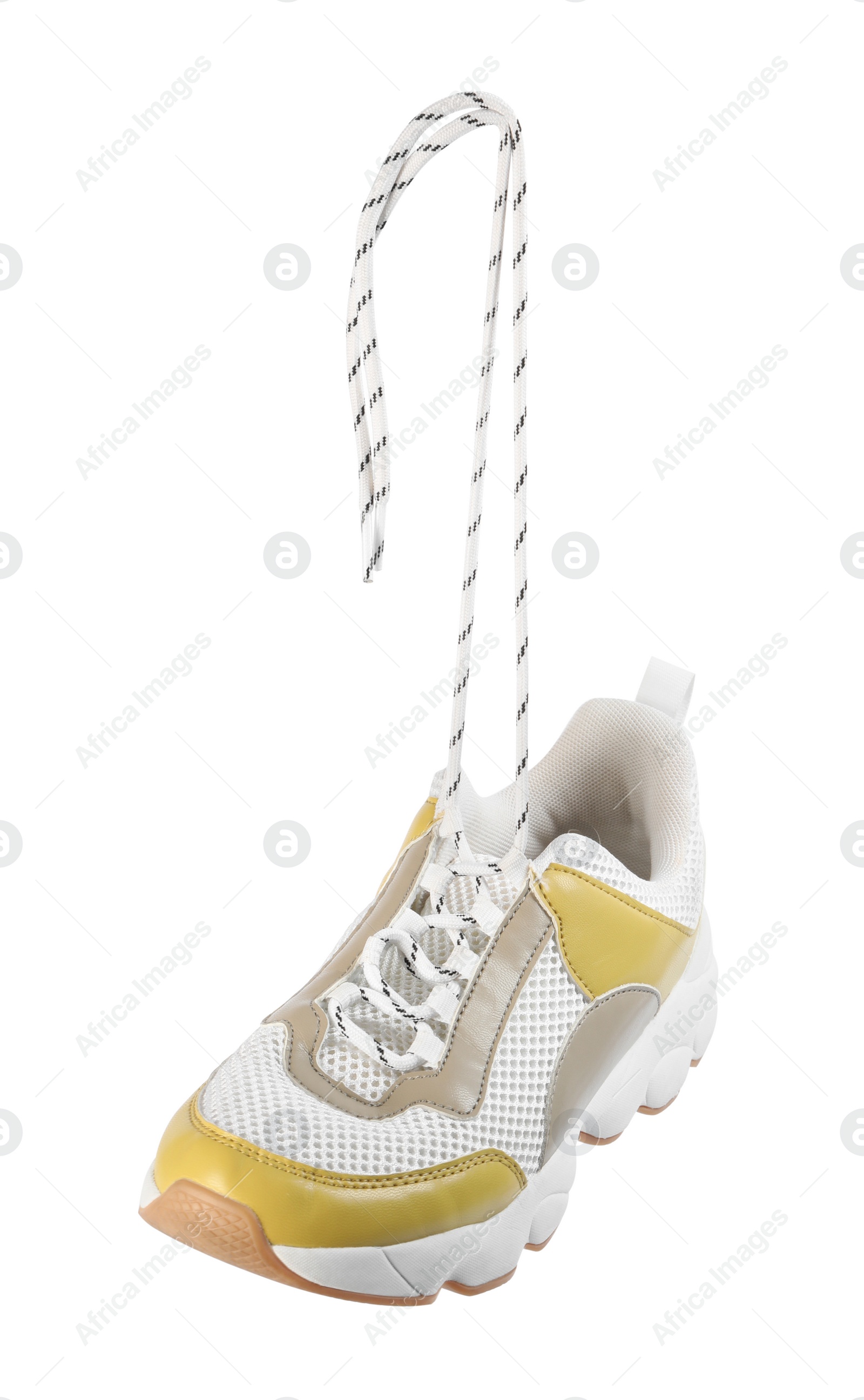 Photo of Stylish shoe with laces hanging on white background