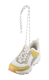 Photo of Stylish shoe with laces hanging on white background