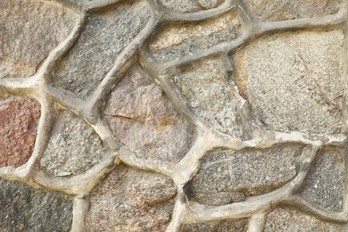 Photo of Texture of grey stone surface as background