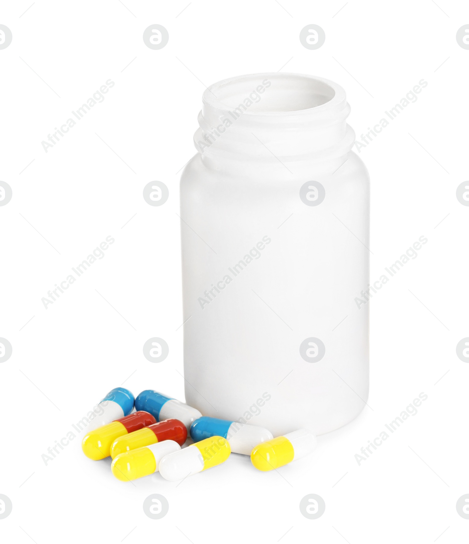 Photo of Antibiotic pills and bottle isolated on white