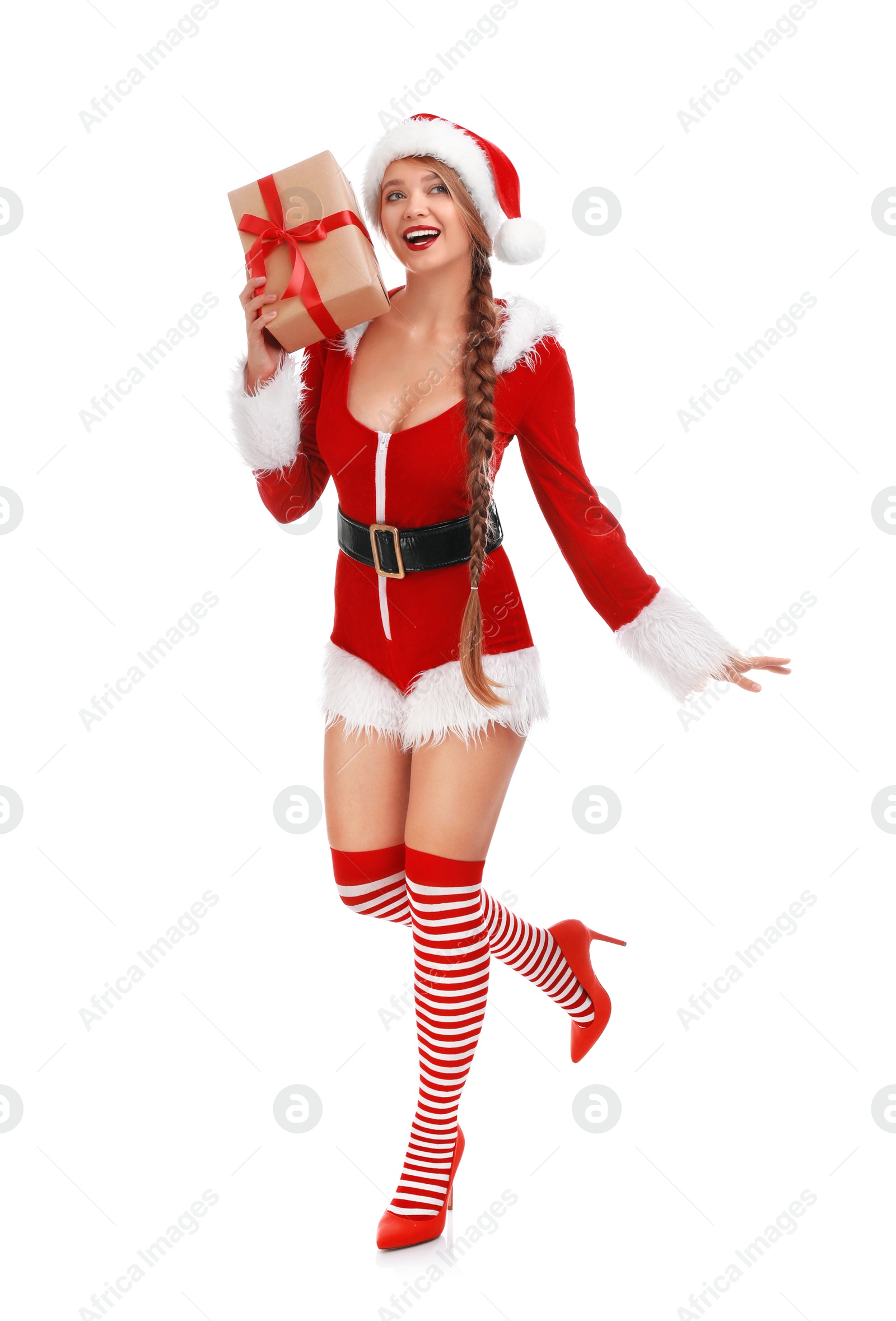 Photo of Beautiful Santa girl with Christmas gift on white background