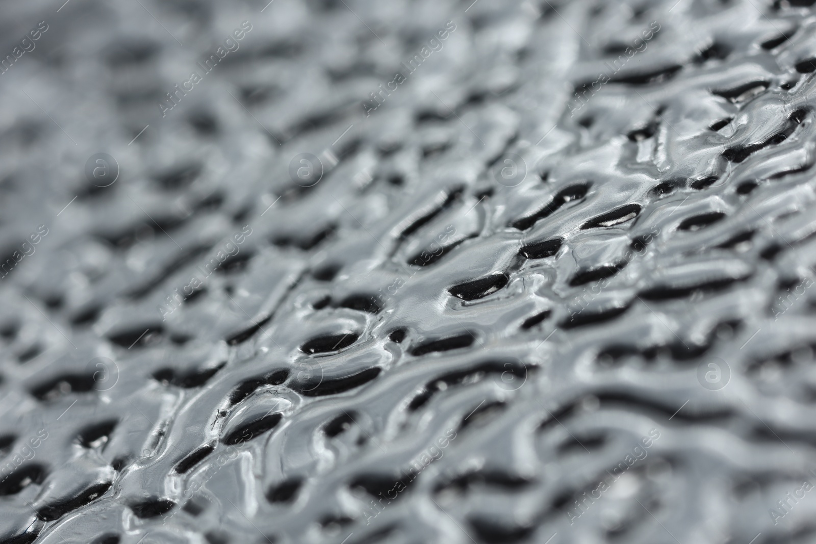 Photo of Texture of foil surface inside softbox as background, macro view