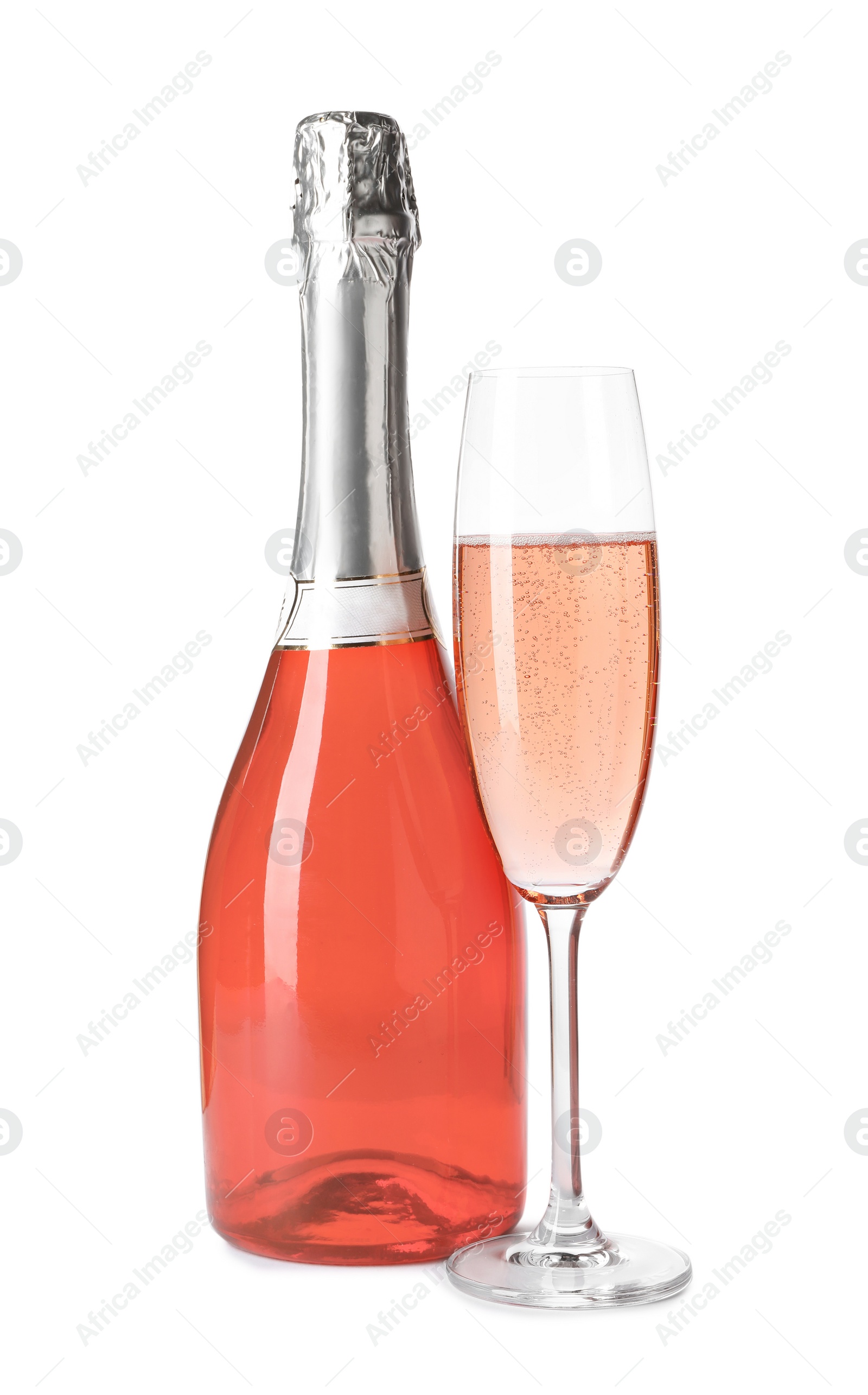 Photo of Bottle and glass of rose champagne isolated on white. Mockup for design