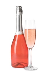 Bottle and glass of rose champagne isolated on white. Mockup for design