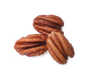 Photo of Tasty pecan nuts isolated on white, top view