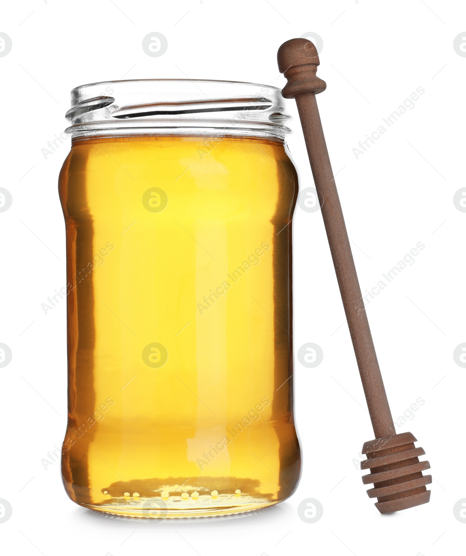 Photo of Jar of organic honey and dipper isolated on white