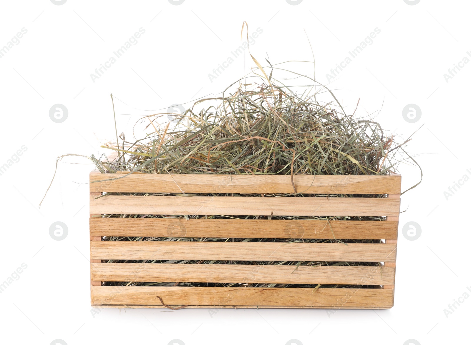 Photo of Dried hay in wooden crate isolated on white