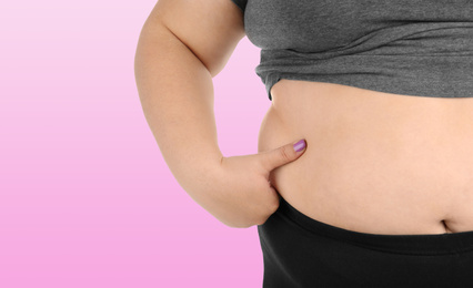 Image of Closeup view of overweight woman on violet background, space for text