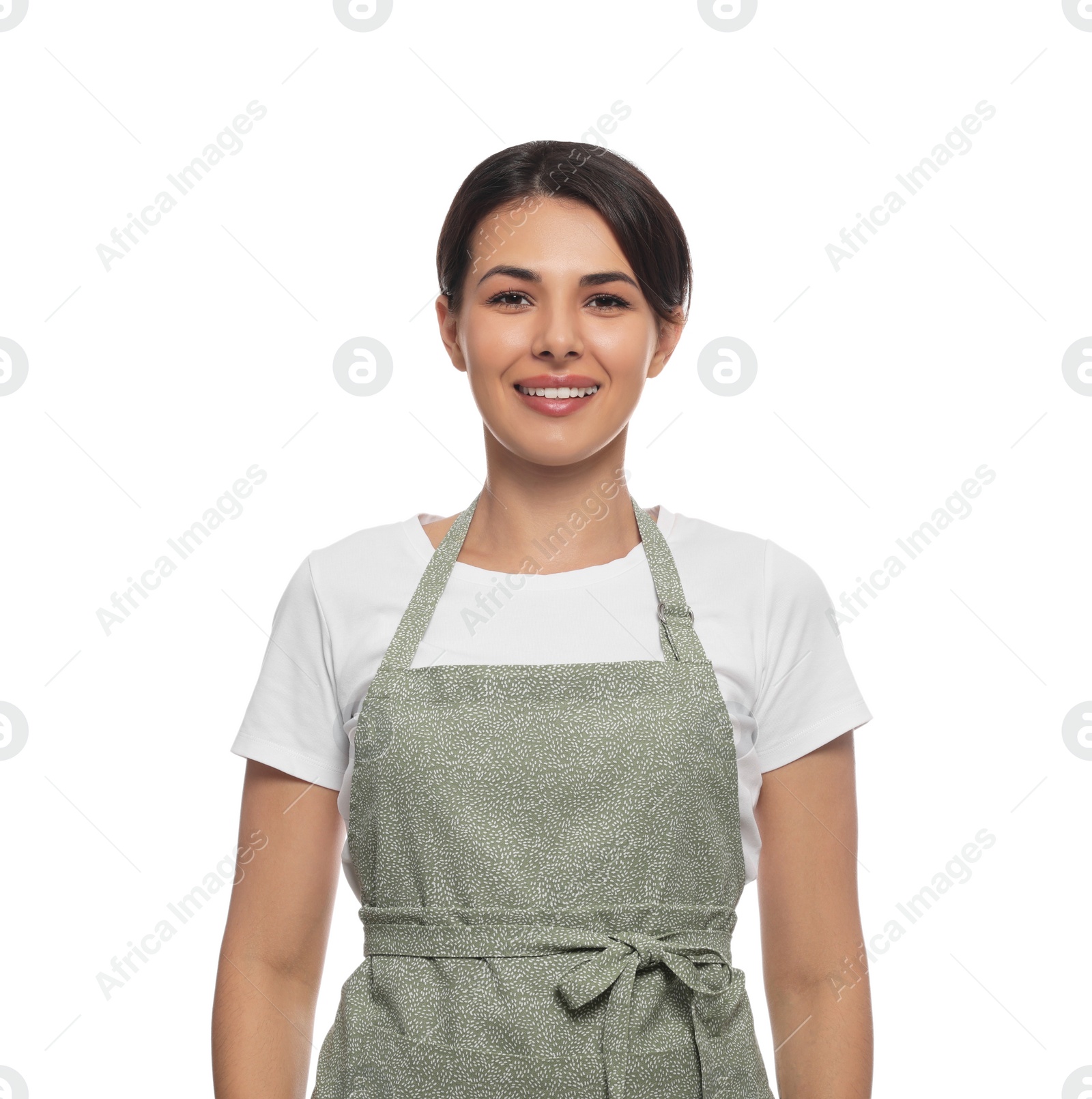 Photo of Young woman in green apron on white background