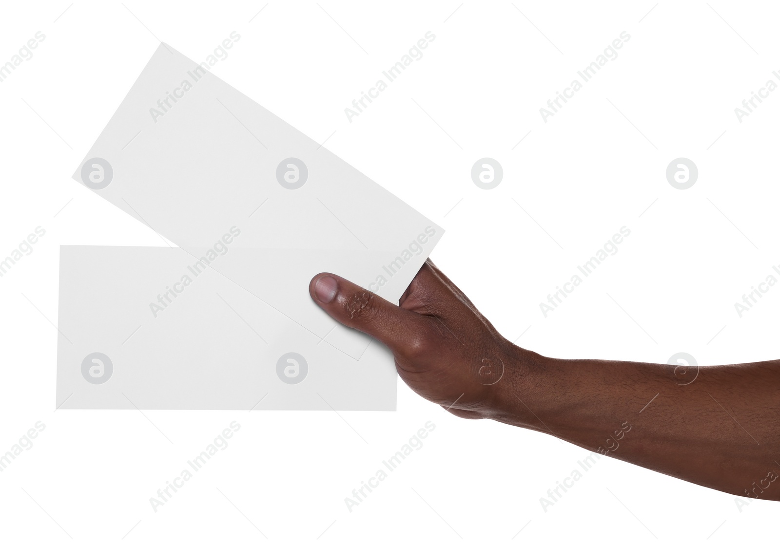 Photo of African American man holding flyers on white background, closeup. Mockup for design