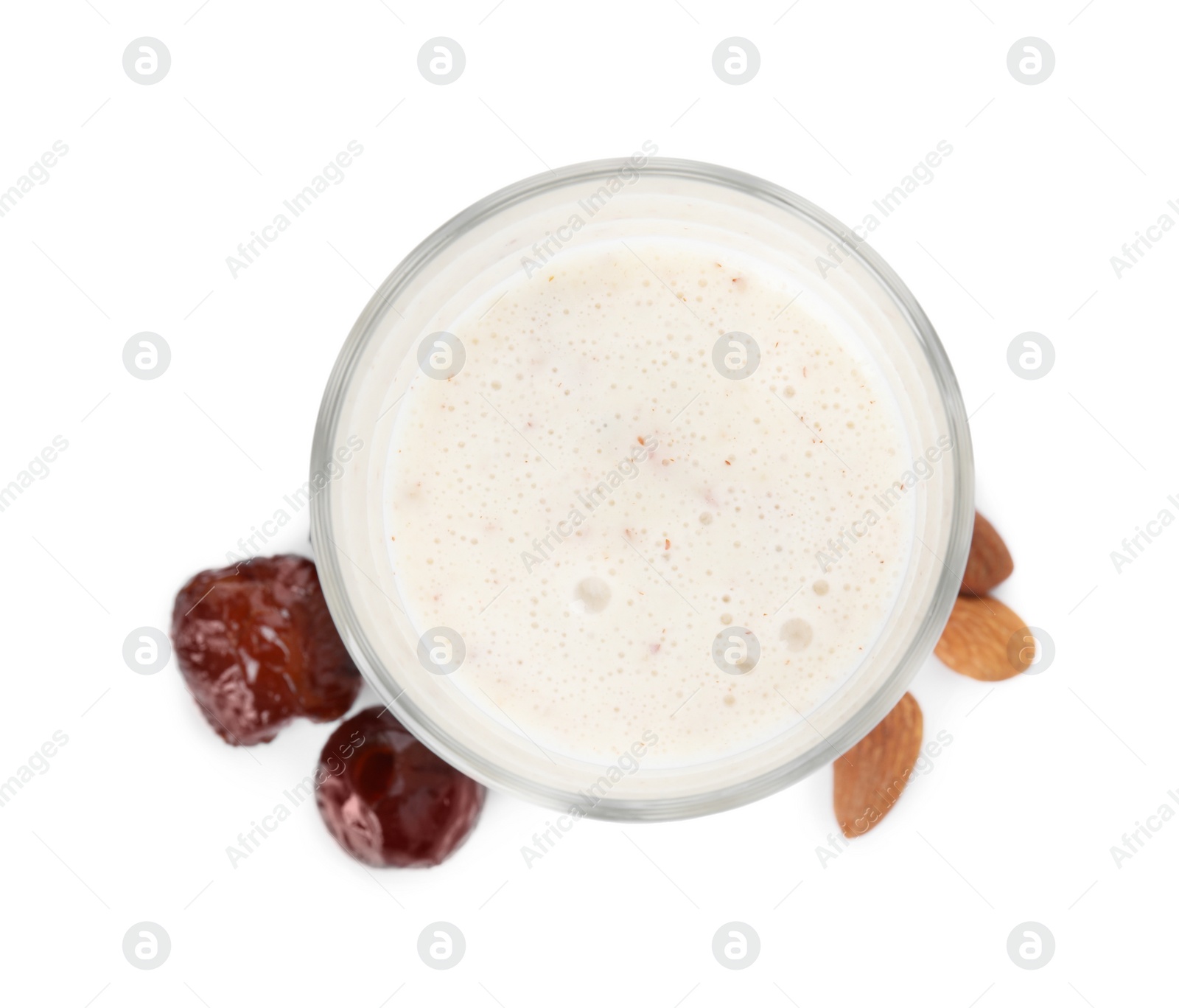 Photo of Glass of delicious date smoothie, dried fruits and nuts on white background, top view