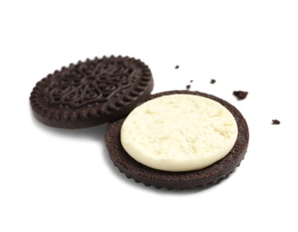 Photo of Tasty chocolate cookie with cream on white background
