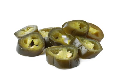 Slices of pickled green jalapeno on white background