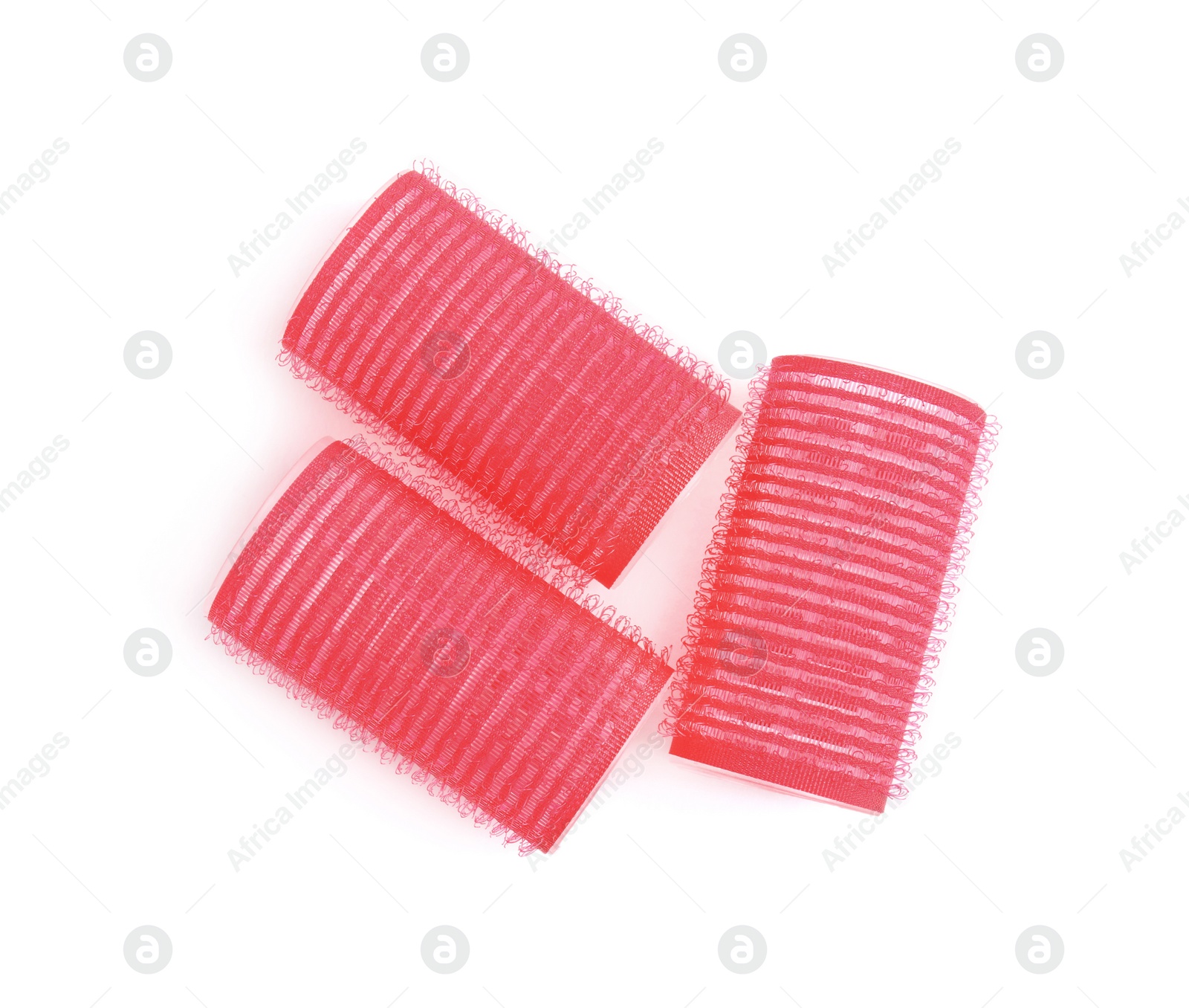 Photo of Hair curlers isolated on white, top view. Styling tool