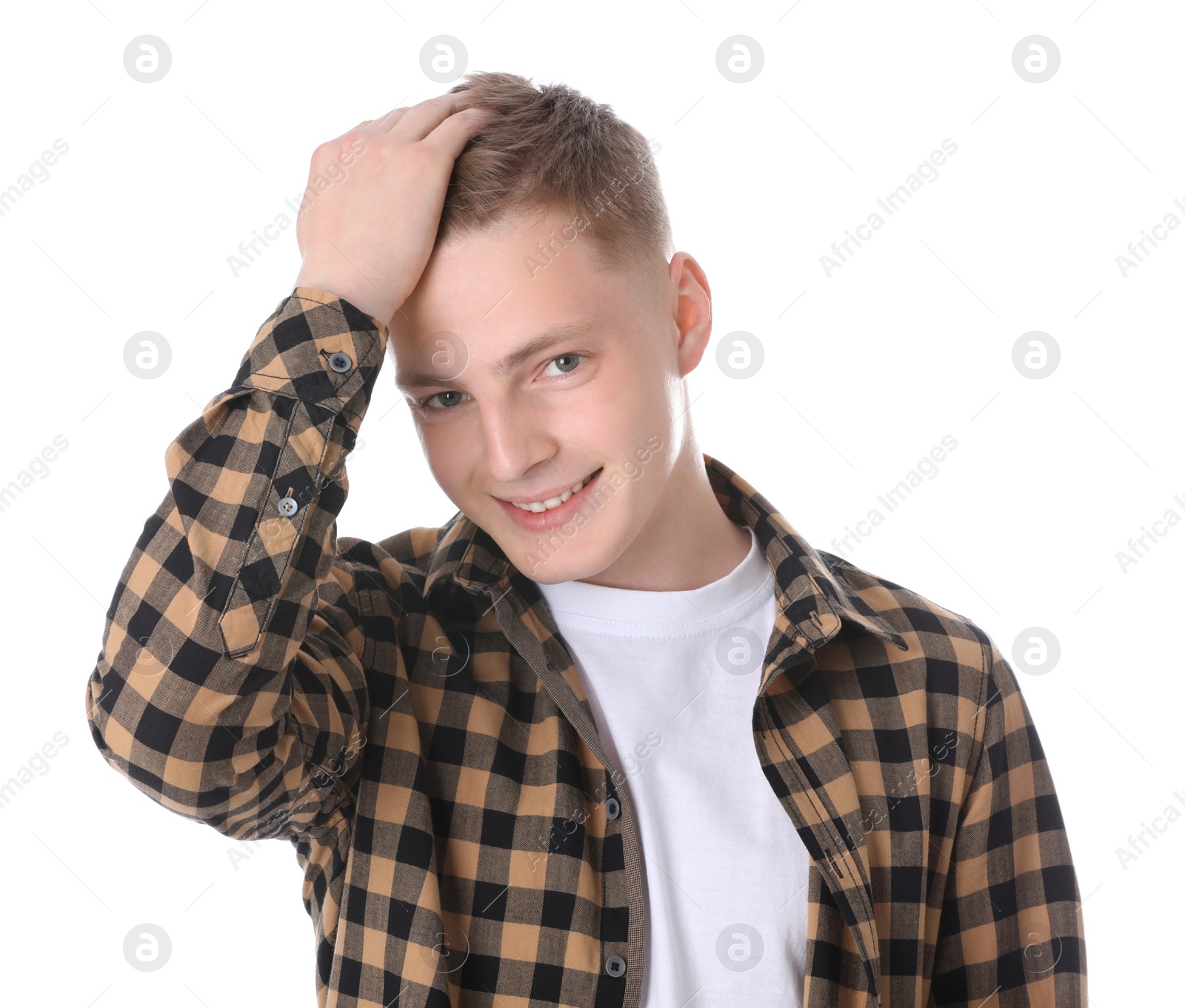 Photo of Portrait of teenage boy on white background