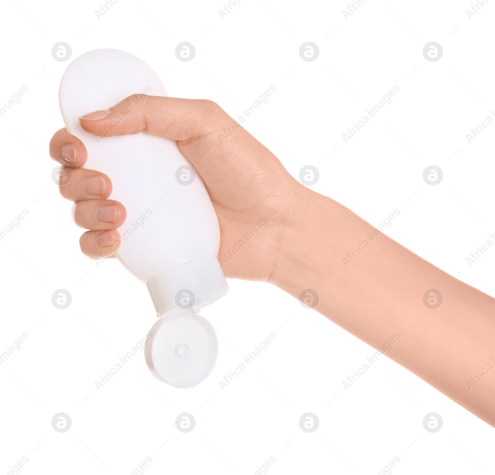 Photo of Young woman holding bottle with hand cream on white background