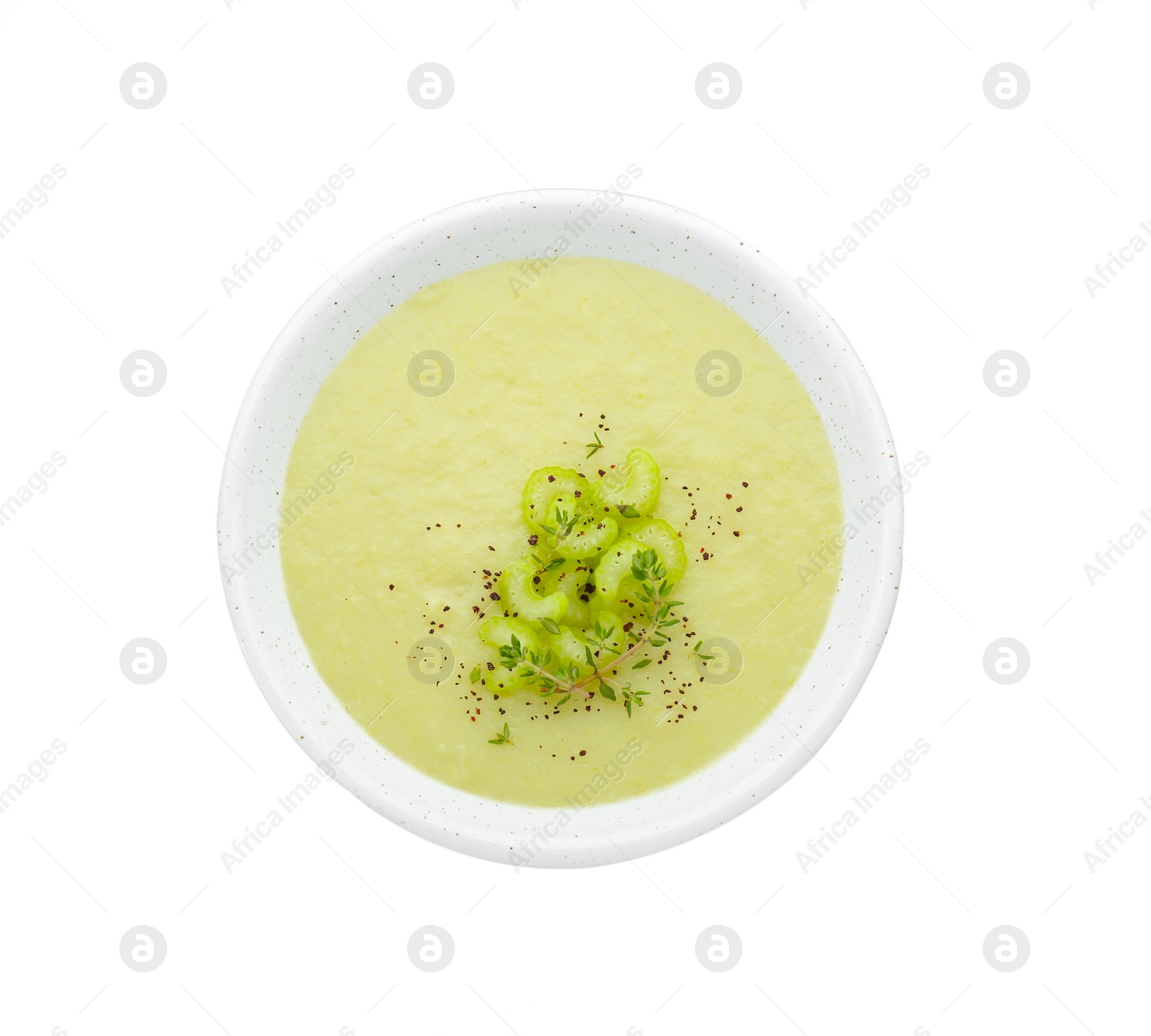 Photo of Bowl of delicious celery soup isolated on white, top view