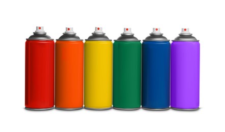 Colorful cans of spray paints on white background