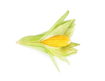 Photo of Ripe raw corn cob with husk isolated on white