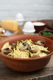 Photo of Delicious ravioli with mushrooms on table, closeup