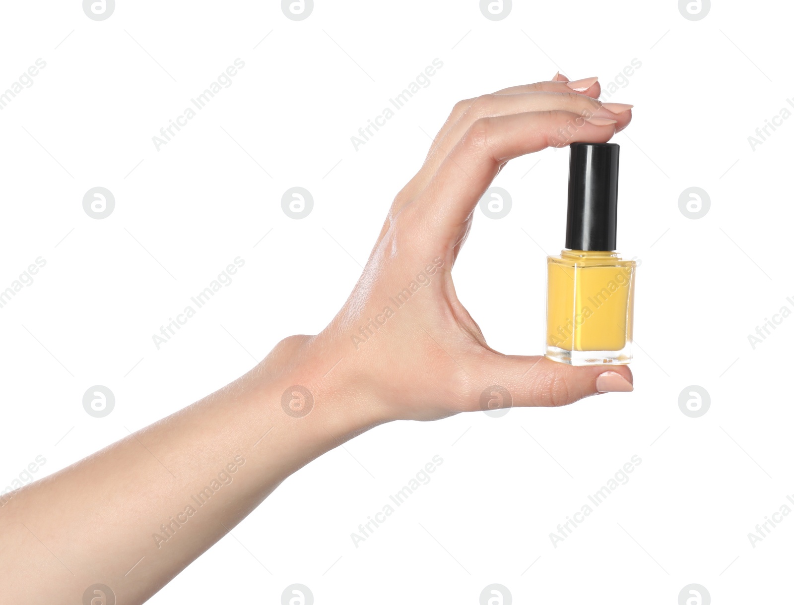 Photo of Woman holding nail polish on white background, closeup