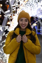 Young woman spending time at Christmas fair