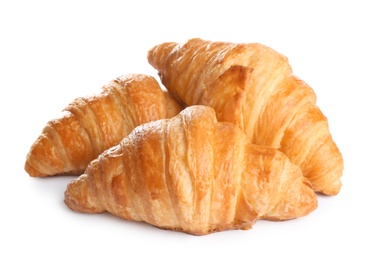 Fresh tasty croissants on white background. French pastry