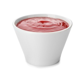 Bowl of spicy chili sauce on white background