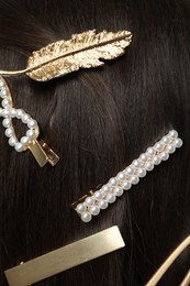 Photo of Woman with beautiful different hair clips, closeup