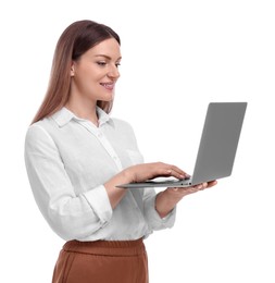 Beautiful businesswoman with laptop on white background