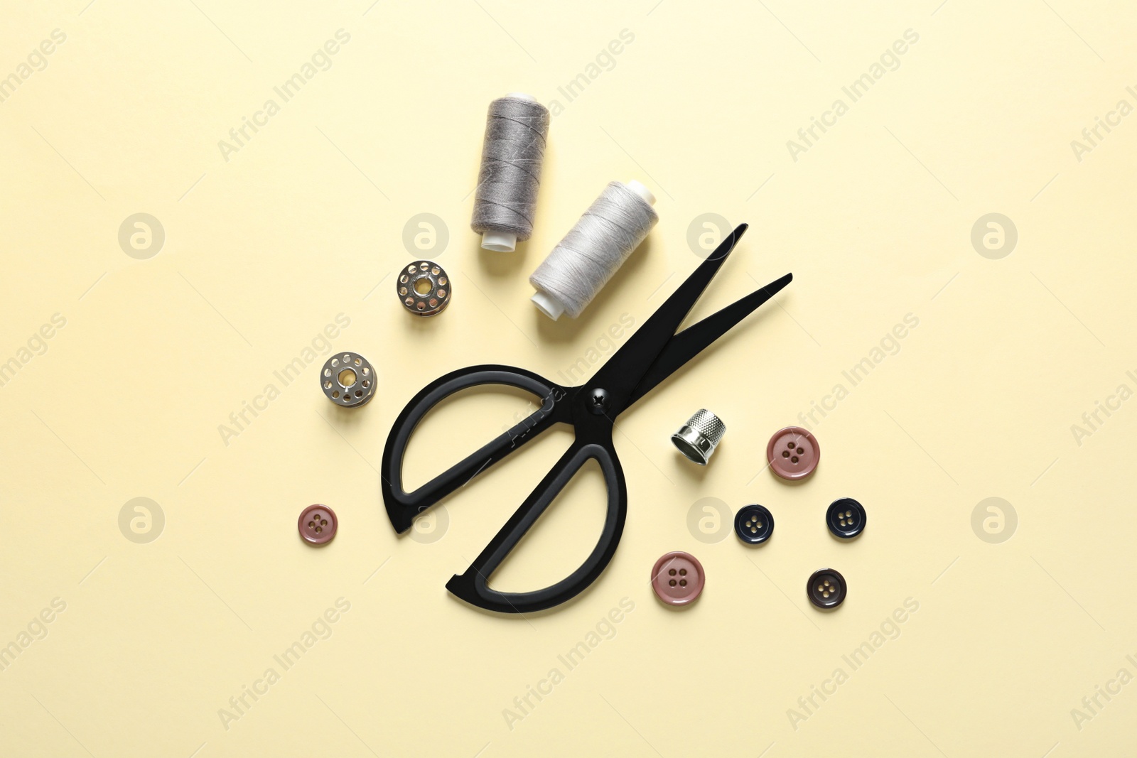 Photo of Flat lay composition with scissors on color background