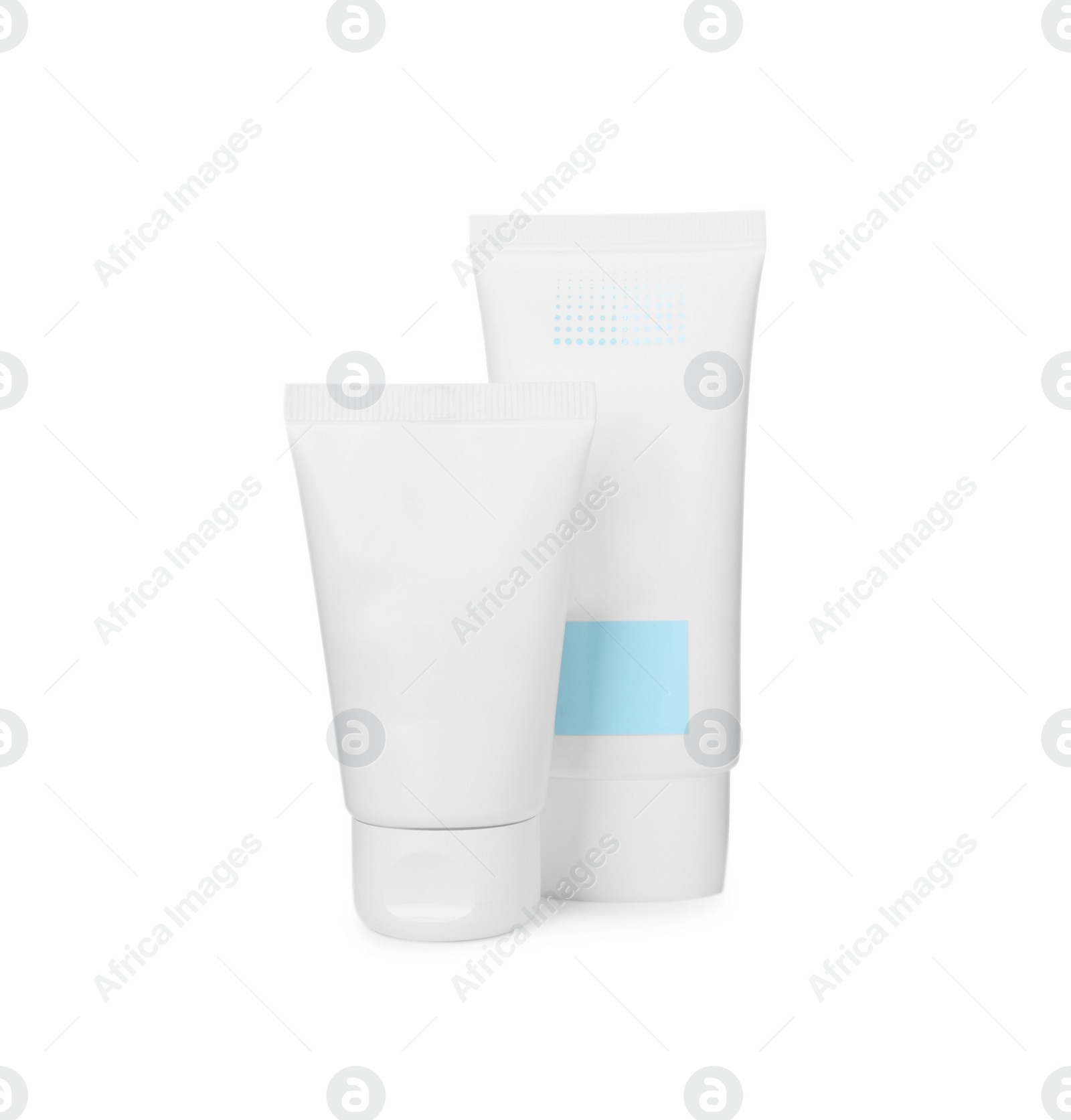 Photo of Tubes of different hand creams on white background. Mockup for design